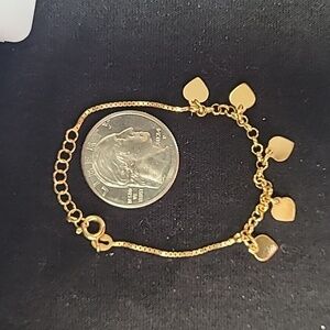 14k gold over Silver 925 Bracelet. Adjustable between 5inch to 6inch.